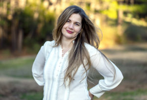 Kristin ten Broeck photo standing outside smiling